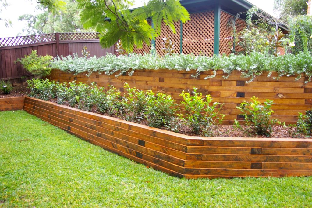 Front Yard Landscaping with wooden plant bed