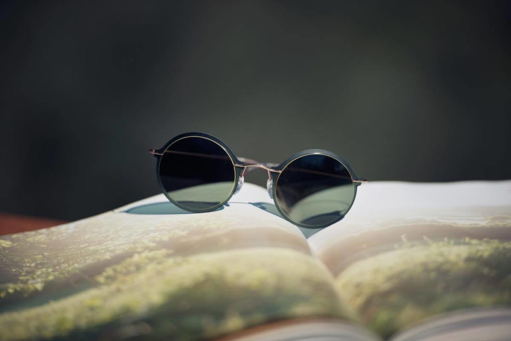 Reflection Of People In Sunglasses On Beach Stock Photo - Download Image  Now - Adult, Arms Raised, Beach - iStock