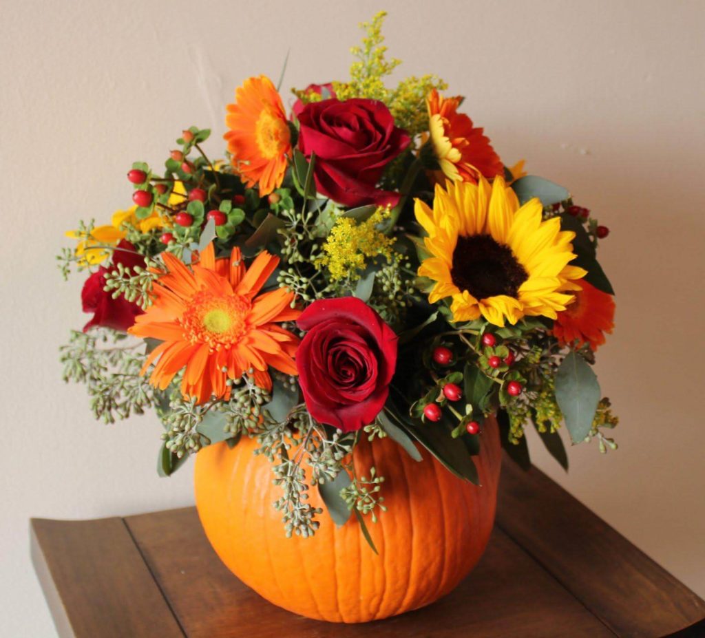 Bevy of Ivory Blooms in Rustic Barrel