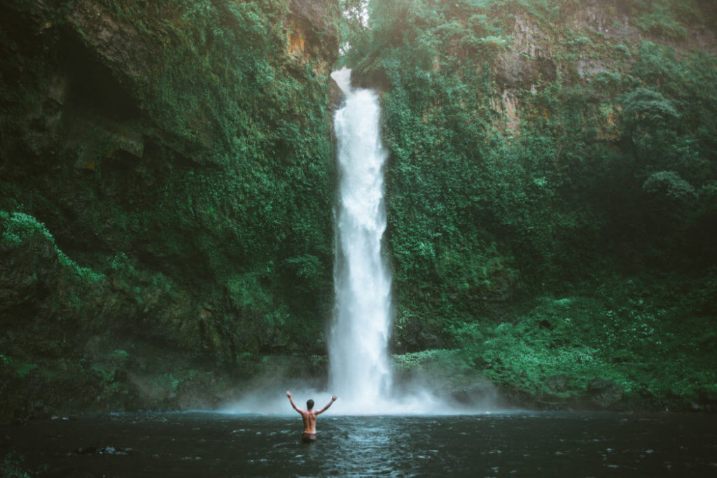 Stand under a waterfall-travel bucket list