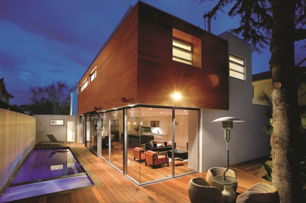 house design with amazing pool light up glass wall