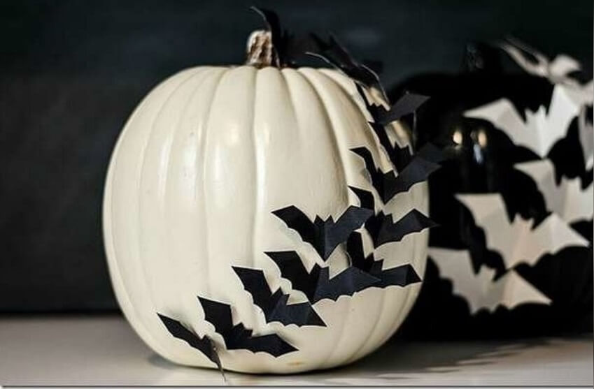 White Pumpkin with black and White Bats Around it