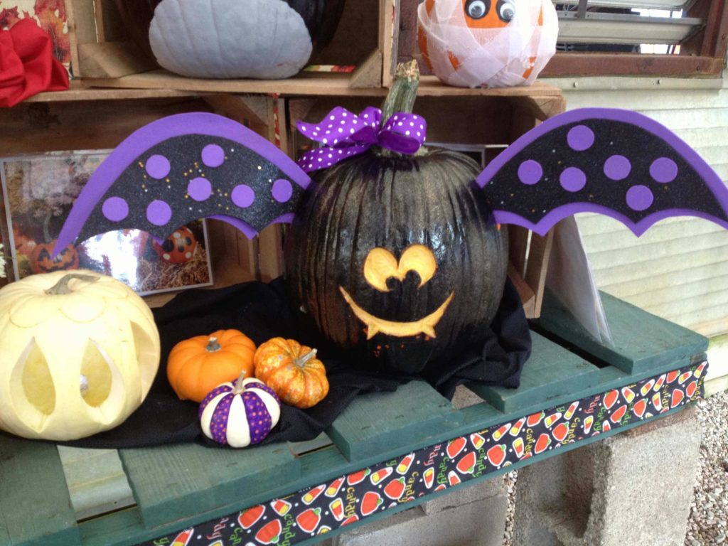 Spooky Black Pumpkin Ideas with wings and Creep Smile