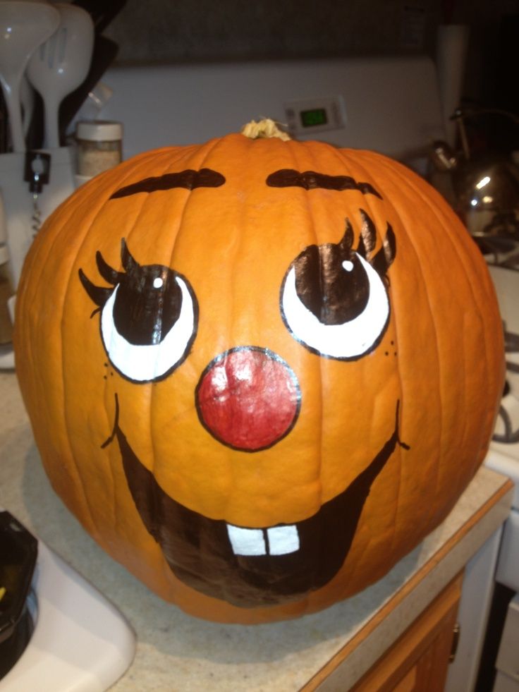 Cute girly pumpkin paint with doodle Eyes and Mouth Red Nose.