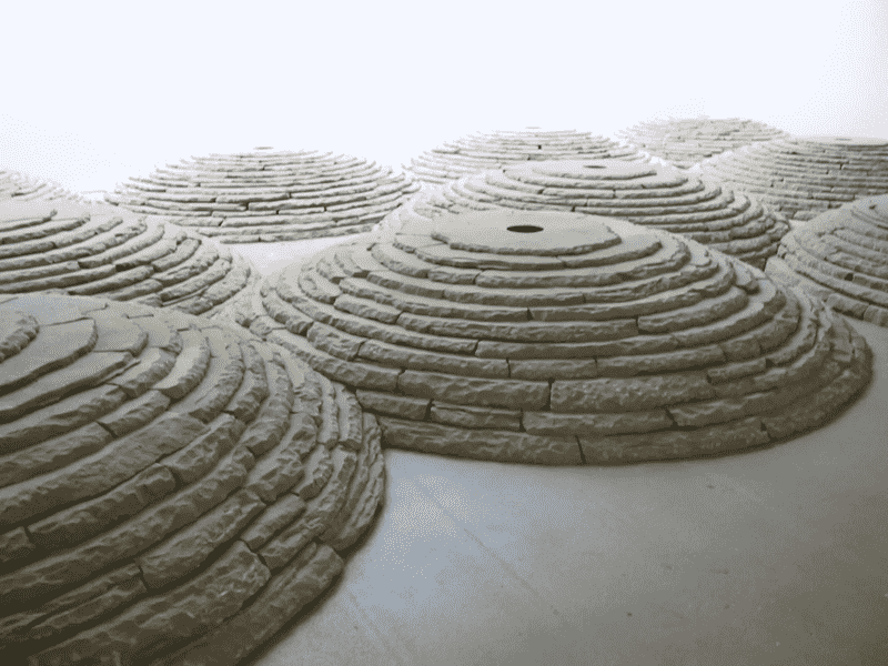 Andy Goldsworthy's land art installation titled "Stone Room" at Yorkshire Sculpture Park.