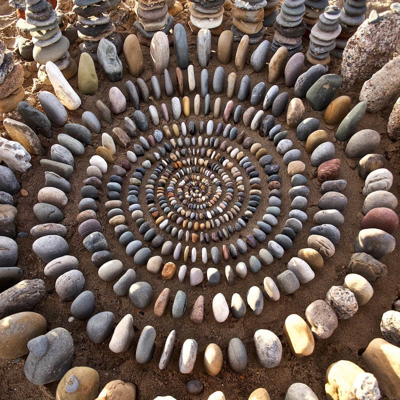 Nature artist Andy Goldsworthy's land art - stones creating an illusion.
