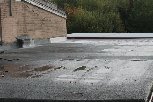 Find A Leak In A Flat Roof 