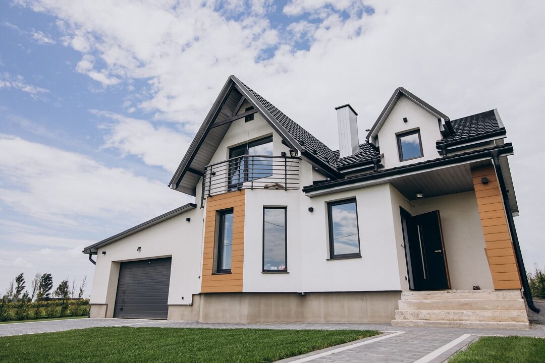 Duplex White house with black Trim and Orange Pillar