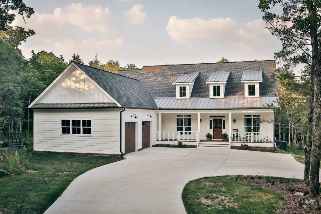 Small black trim White House with long pathway