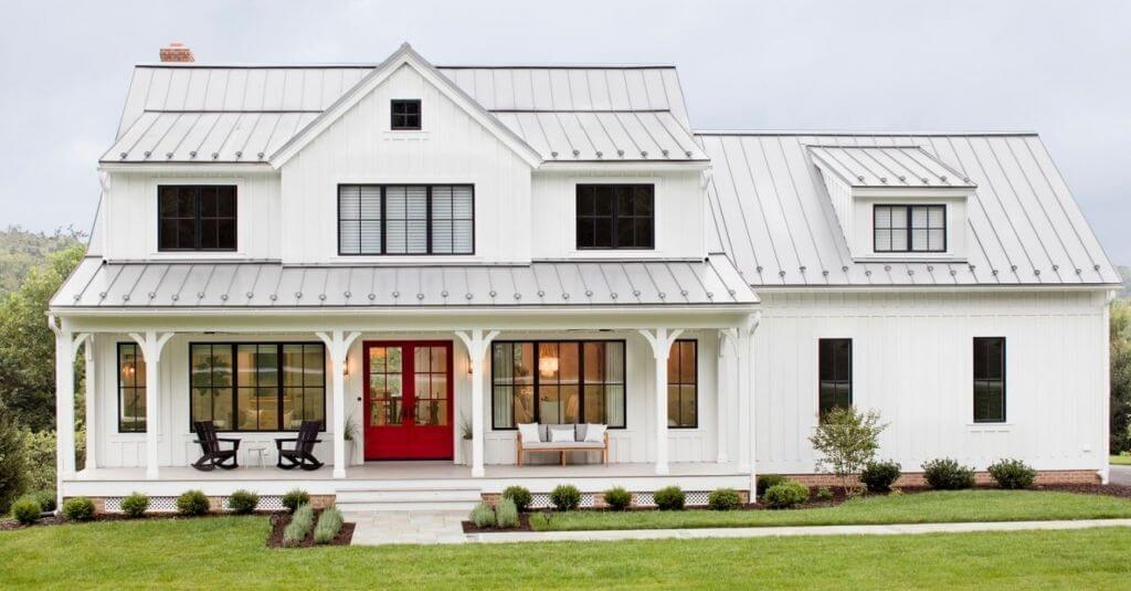 small Colonial White House with red Door and Black Trim