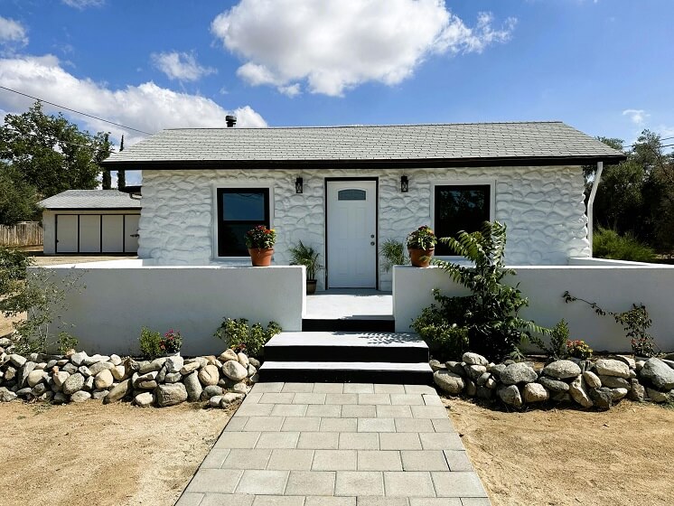 small White Brick house with Trim