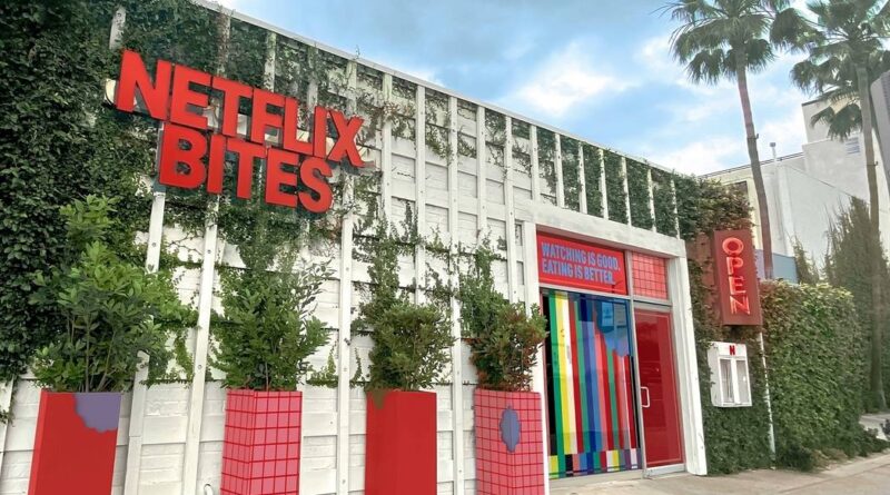 Netflix Bites Pop-Up Restaurant front Entry side with netflix intro vibe and grass all around it