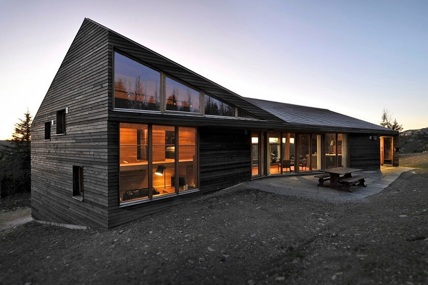 Unique shape big black House with Windows