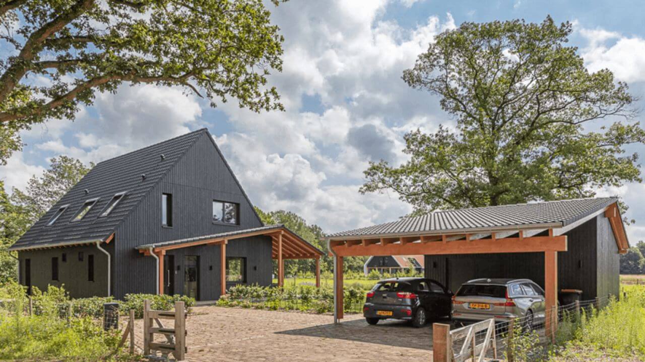 Big Open Space in front of Black sustainable architectural House with car Parking