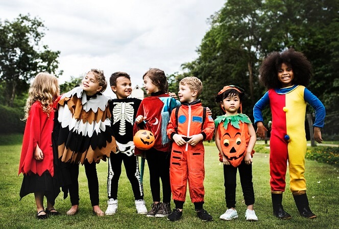 Kids wearing costume party during fall Autumn Season halloween day