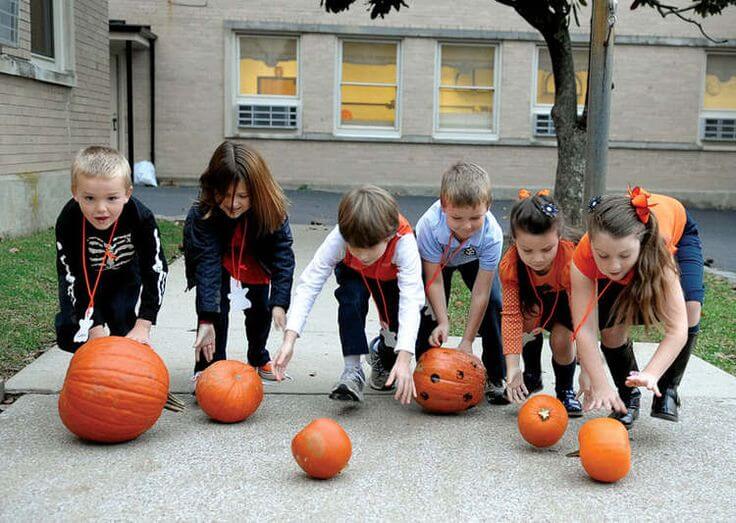 pumpkin rolling race for Halloween Fall Month