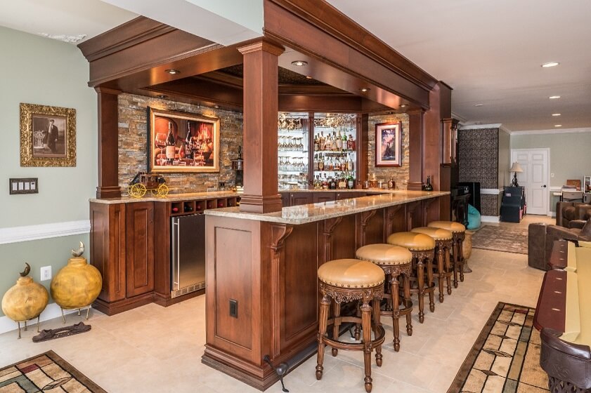 Wooden basement bar cabin with Wines and Sitting Arrangement