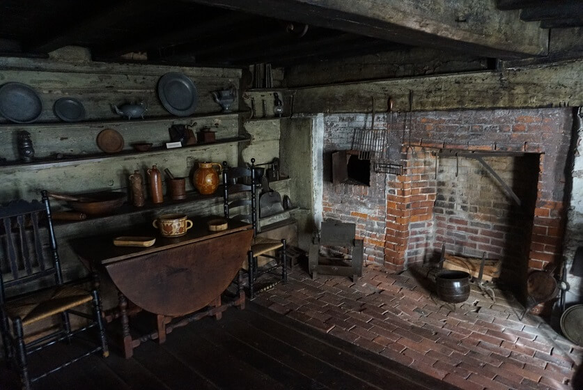 Basic restored First Floor Brick Kitchen with Shelfs of Fairbanks House