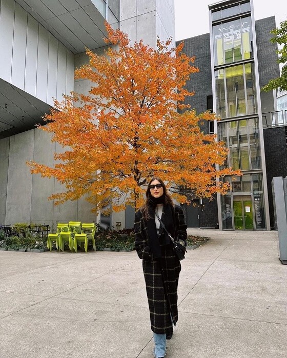 Girl Posing Below Orange Tree Outside The Whitney Museum of American Art