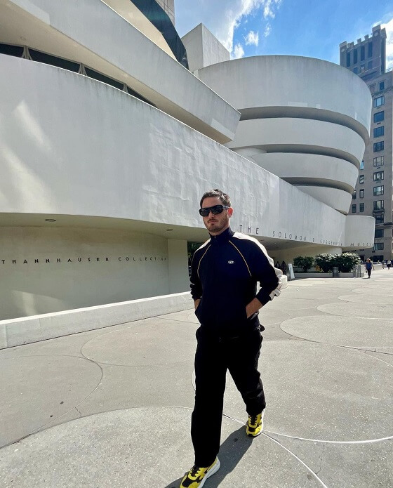 Men Walking in front of The Guggenheim Museum for Instagram